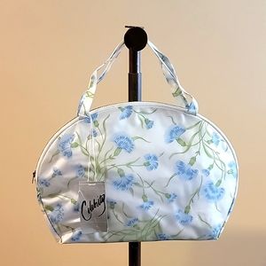 Vintage 1960s Mod NWT Celebrity brand blue floral cosmetic zippered bag.
